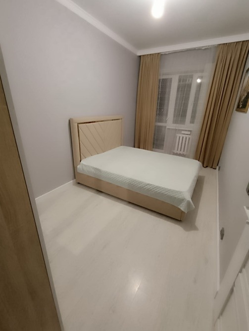 Жаңа ұйықтайтын бөлме терезелерімен