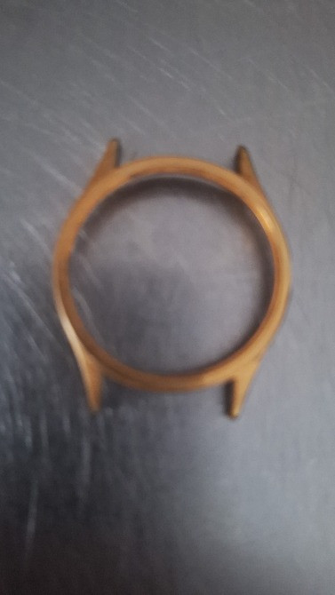 Металлдан жасалған сағат қорабы