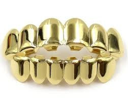 золотые зубы из металла