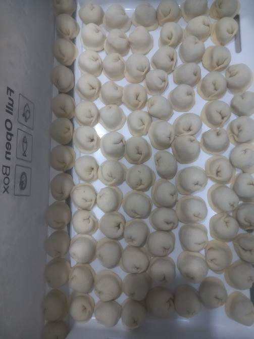 Мұздатылған пельмендер, коробкада орналастырылған