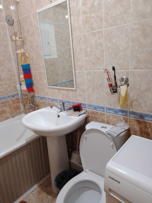 Ванная комната с ванной, умывальником и туалетом