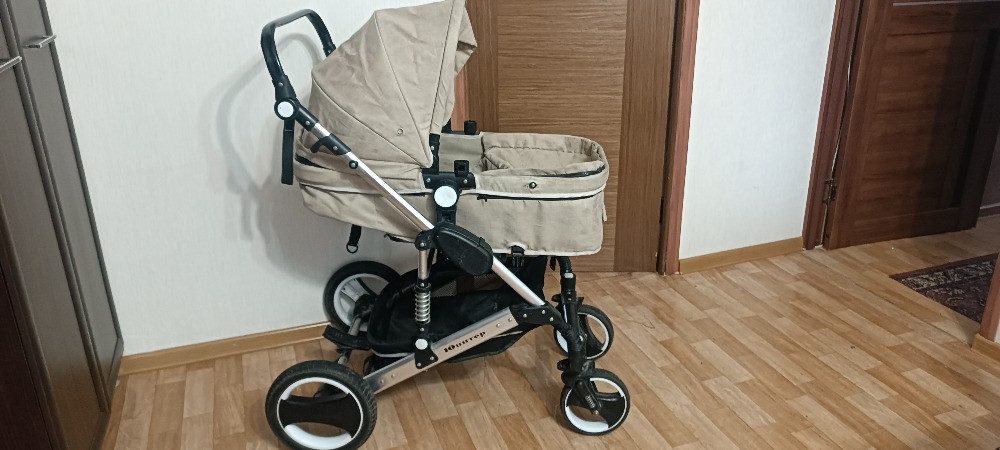 Коляска с улучшенным дизайном и открытым сиденьем