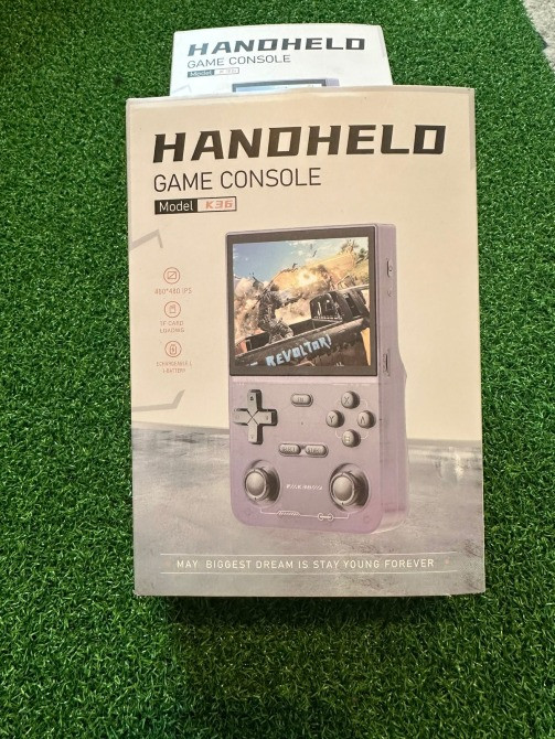 Ойын консолі Handheld қаптамасы, модель қорапта көрсетілген