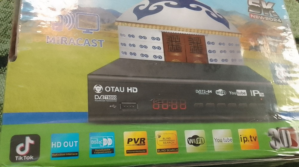 IPTV-ресивер OTAU HD қаптамасының бүйір беті сурет және сипаттамалармен