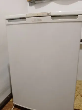 Фронтальное изображение верхней части холодильника