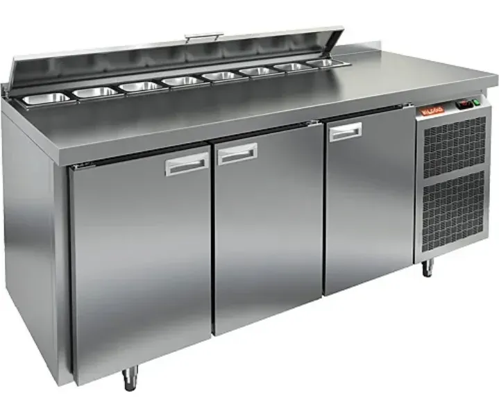 Стainless steel commercial refrigerator with three doors and a salad prep area on top