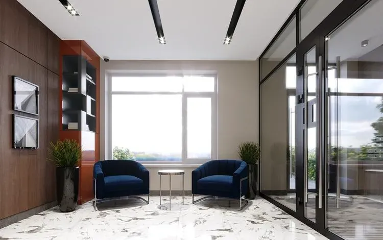 Интерьер современного холла с мягкими диванами