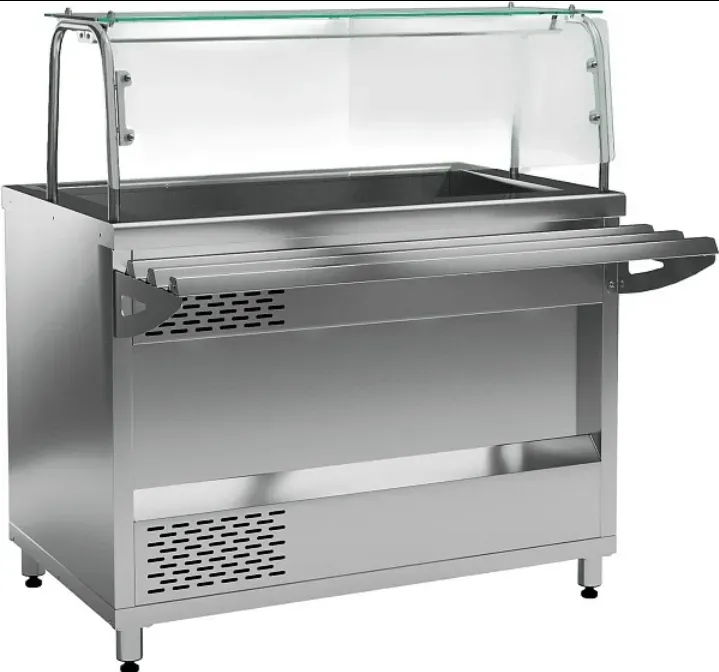 Нержавеющей болаттан жасалған столдық прилавок, үстіңгі әйнегі мен тағамдарды қызмет көрсетуге арналған сөрелерімен.