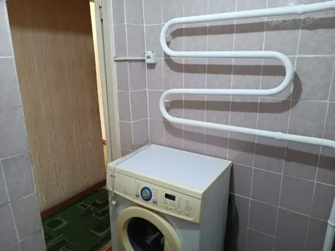 Стиральная машина в ванной комнате
