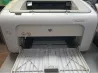 HP LaserJet P1005 принтері ашық қағаз лоткасымен