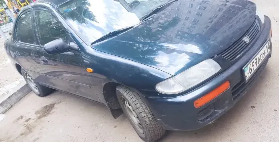 Автомобиль с правой стороны, вид с наклоном, номер 698ADM14