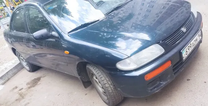 Автомобиль с правой стороны, вид с наклоном, номер 698ADM14