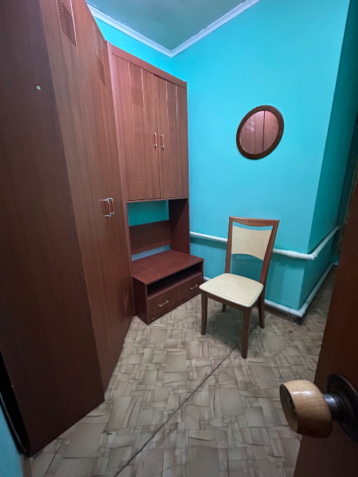 Гардероб пен орындықты бөлме