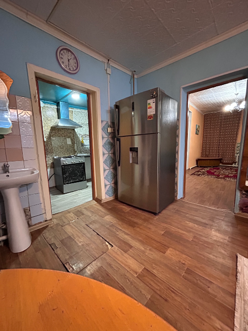 Плита мен тоңазытқышы бар асхана