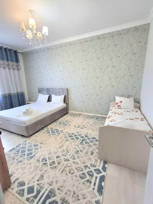 Вторая спальня с односпальной кроватью и уютным декором