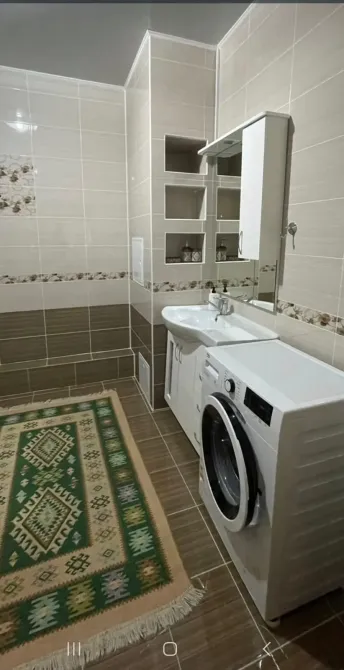 Заманауи жуынатын бөлме кір жуу машинасымен