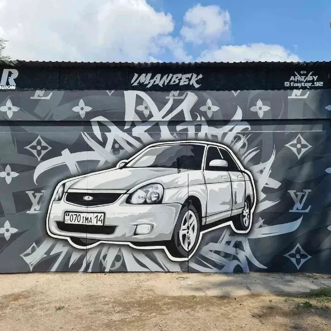 Граффити с изображением автомобиля в стиле Луи Виттон