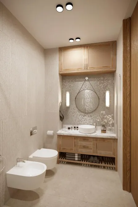 Стильная ванная комната с тёмным деревянным шкафом и круглым зеркалом