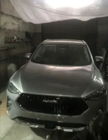 Покраска красного автомобиля в автосервисе