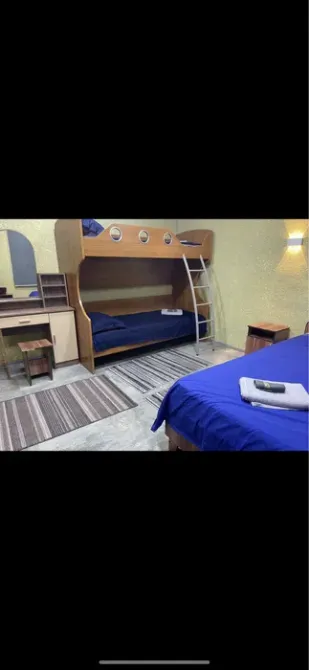 Екі қабатты төсекпен бөлме