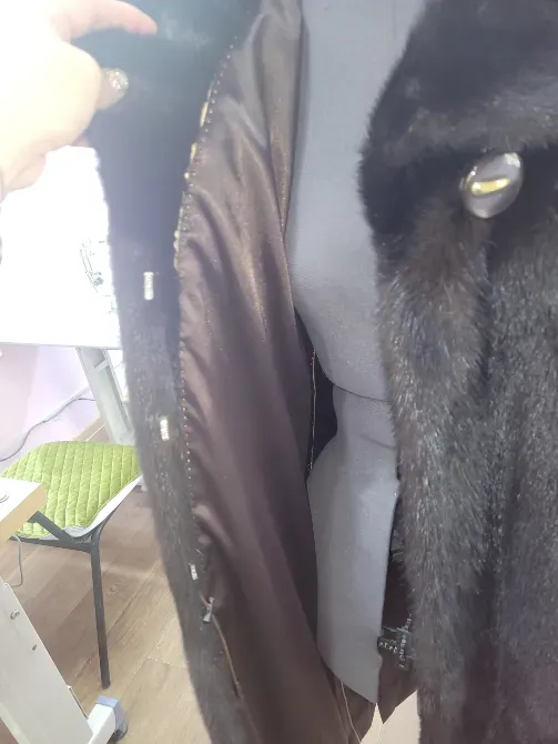 Внутренняя часть пуховика с застежкой