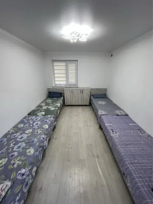 Спальня с двумя односпальными кроватями