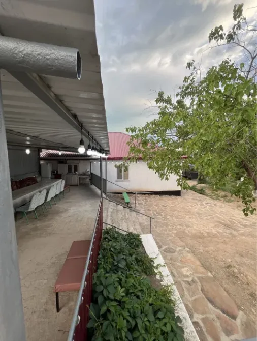 Внешний вид крытой площадки и дома