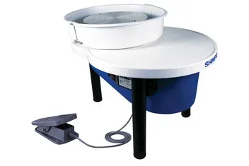 Работящий гончарный круг с белым верхом и синим основанием