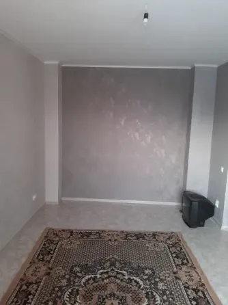 Комната с диванами и ковром