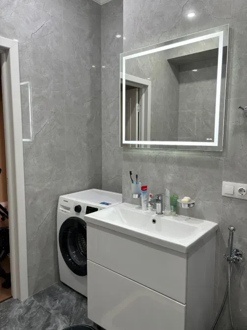 Ваннада кір жуғыш машина мен раковина