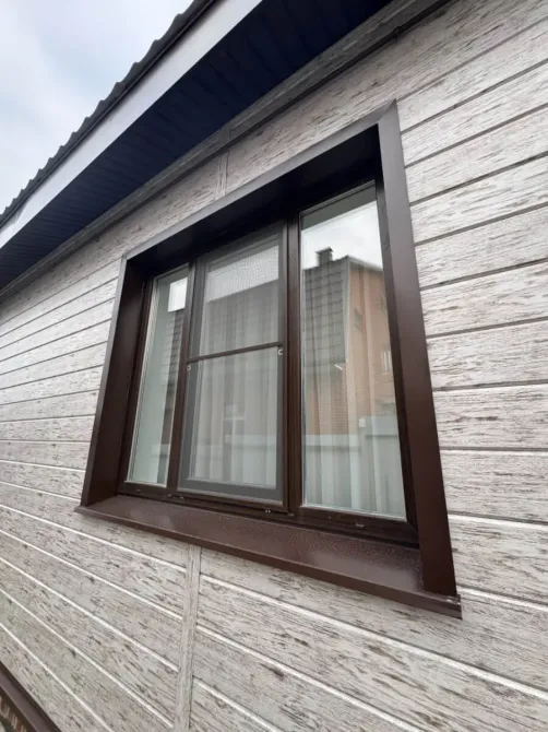 Ағаш өңдеумен және металл профилімен терезе