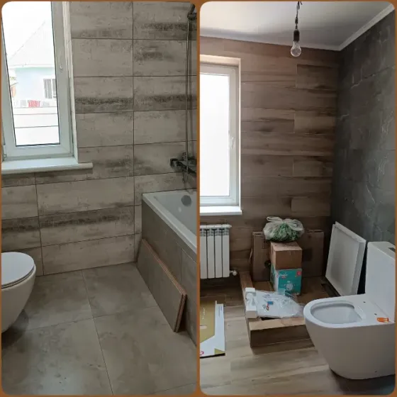 Унитаз на фоне мраморных стен в ванной