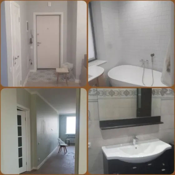 Унитаз на фоне мраморных стен в ванной