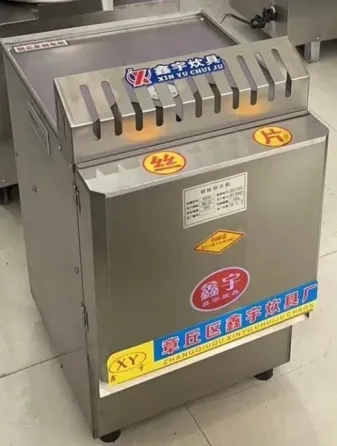 Металл корпусымен және желдету тесіктерімен жабдықталған қуырғыш құрылғы. Ресторандар мен ас үйлерде тағамды қуырғанда қолданылады.