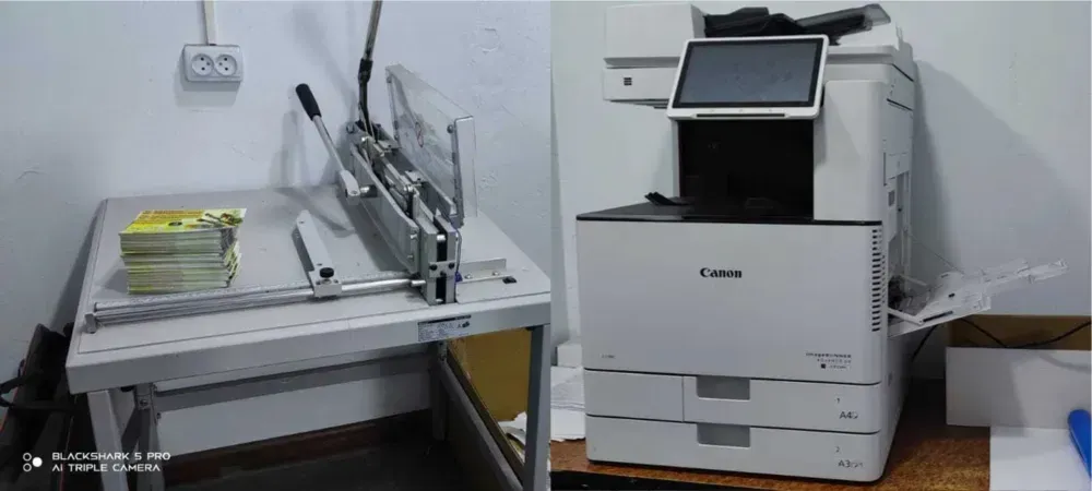 Оборудование для резки и цветная принтер для печати документов