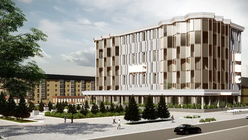 Современное здание с уникальной архитектурой и зелеными насаждениями на переднем плане