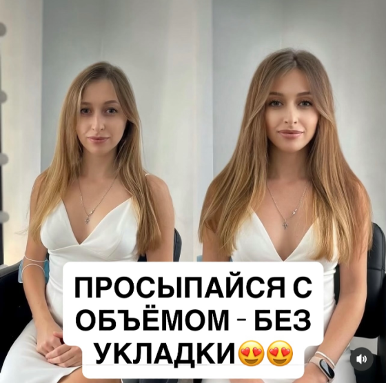 Ұзын шашты қыз ақ көйлекте, стайлингсіз шаш үлгісін көрсетіп, 