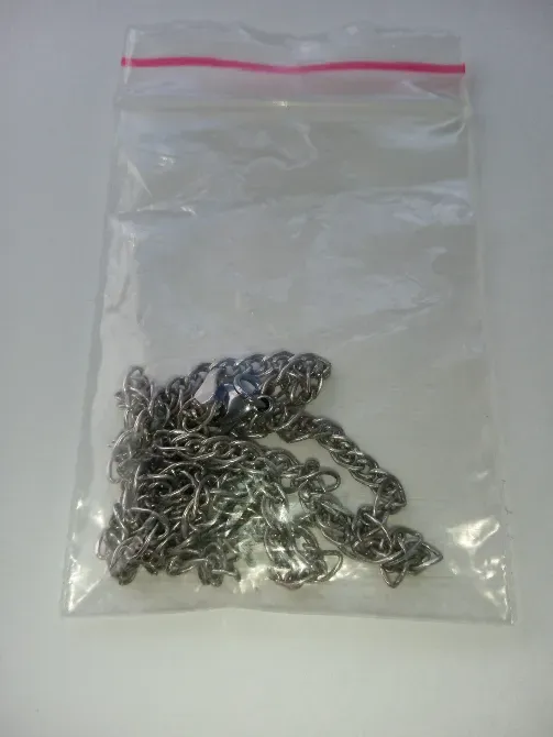 Запечатанная цепочка из серебра в прозрачном пакете