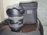Sigma 10-20mm объективі ағаш фондағы қаптамамен