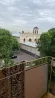 Ғимараттың қоңырау мұнарасы мен балконнан көрінісі
